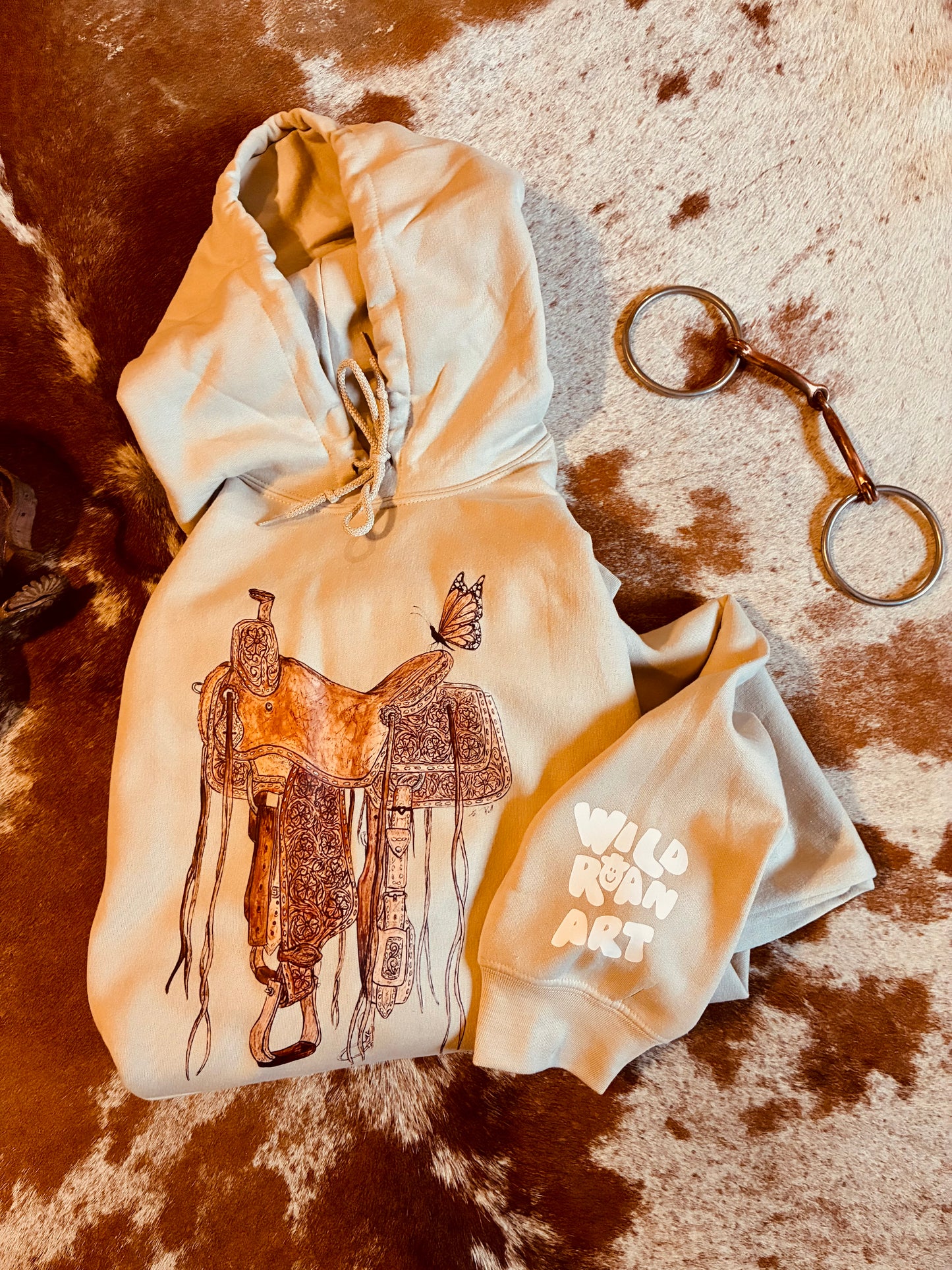 Flutterby Ride Tan Merch