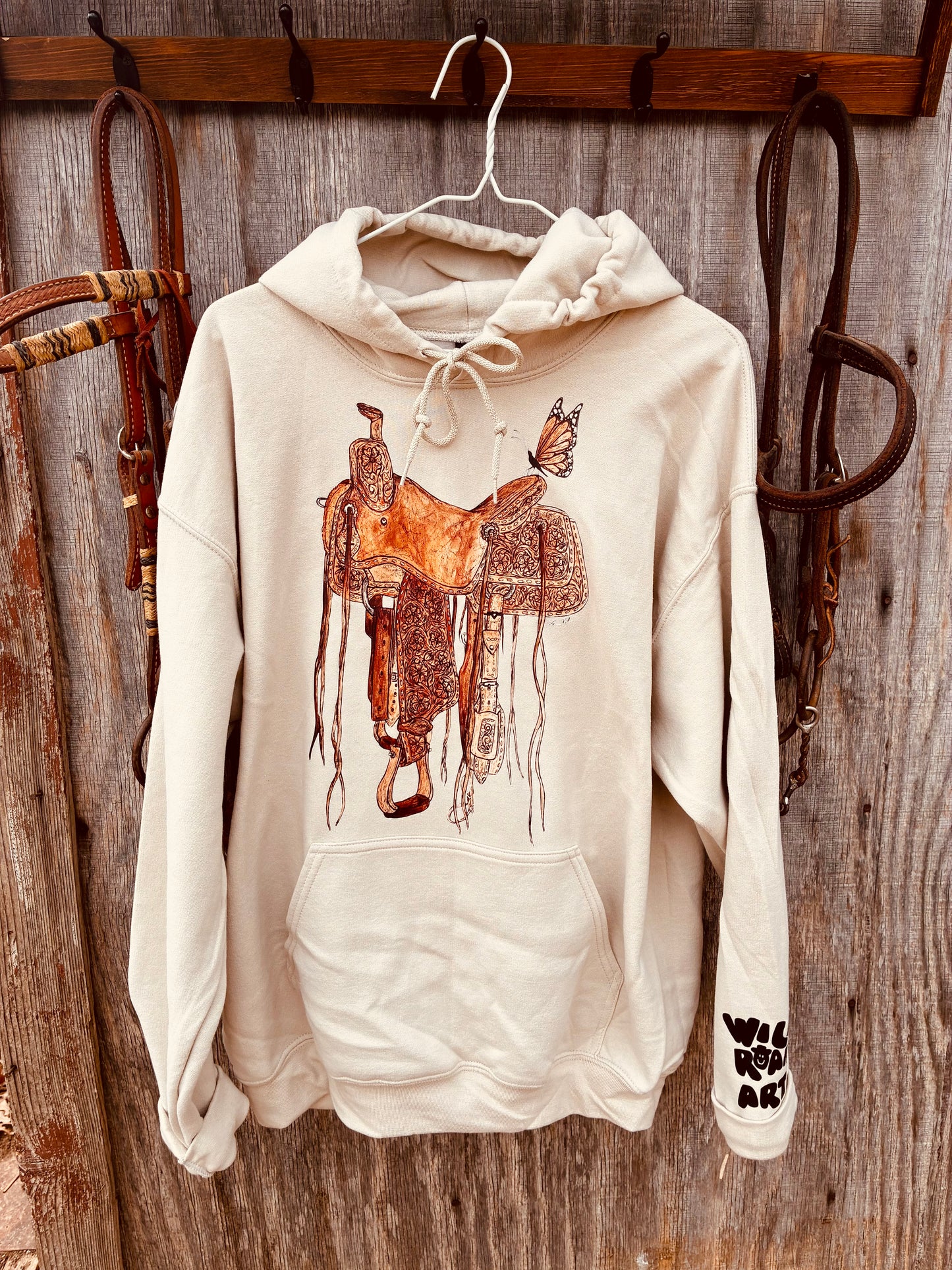 Flutterby Ride Tan Merch