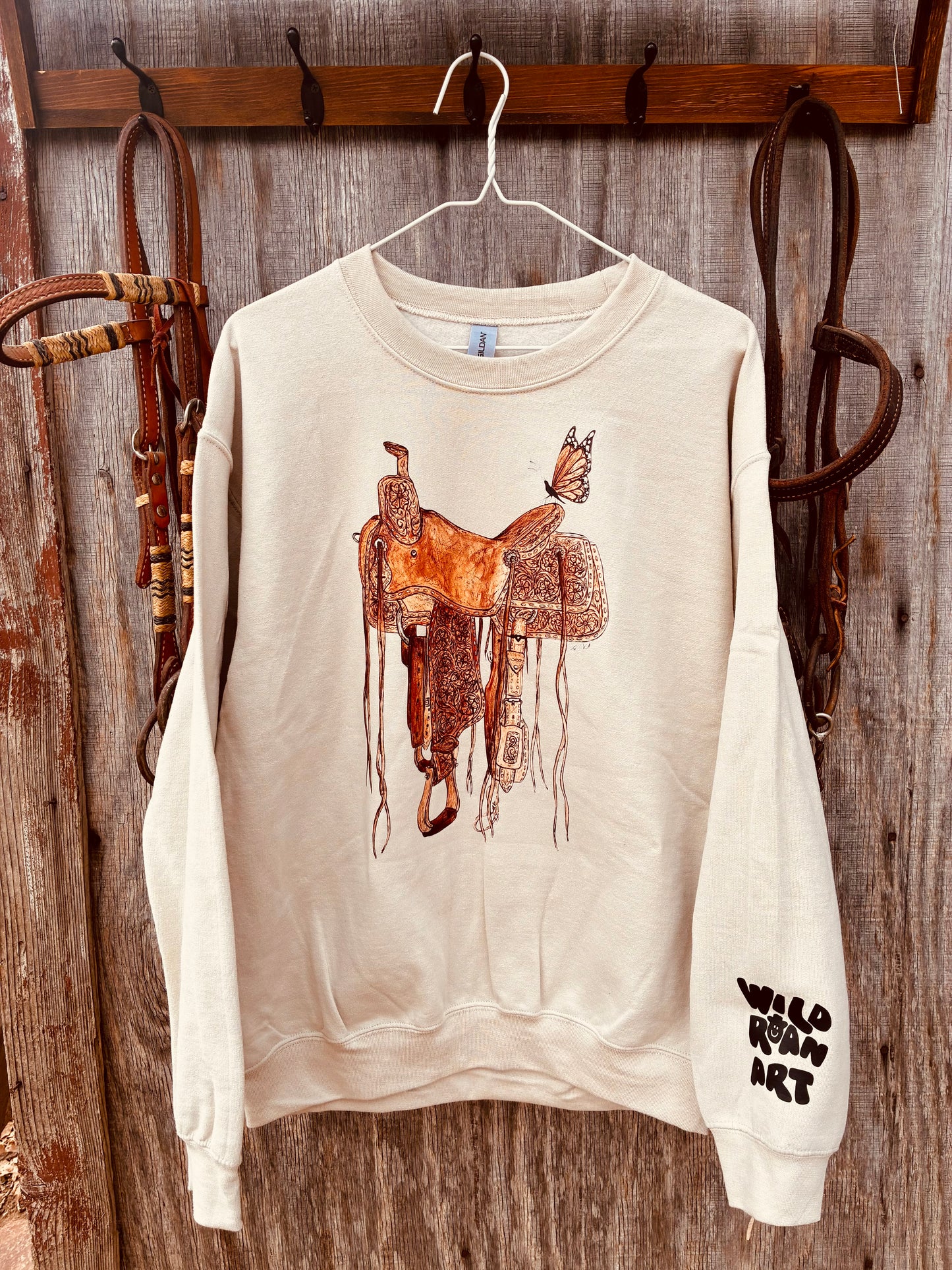 Flutterby Ride Tan Merch